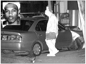 Photo of slain driver and car at crime scene