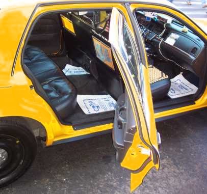 Photo of a NYC taxi with a partition