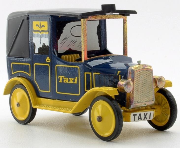 An antique toy taxi