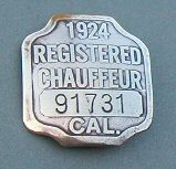 Photo of a metal chauffeur badge